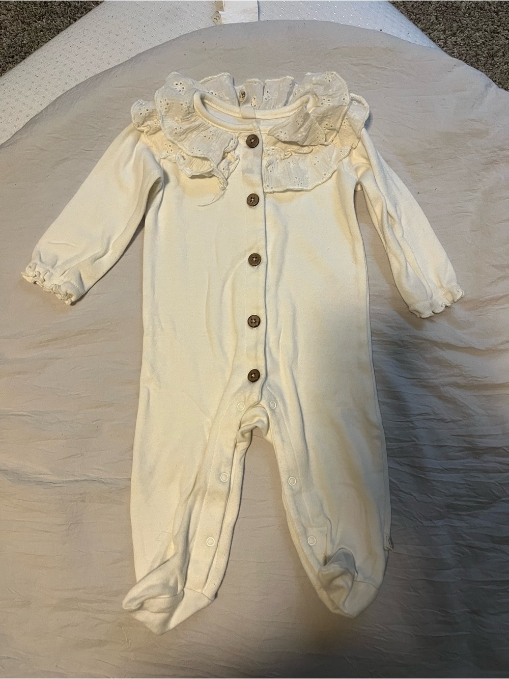 Cream Ruffle-Collar Baby One-Piece with Button Front